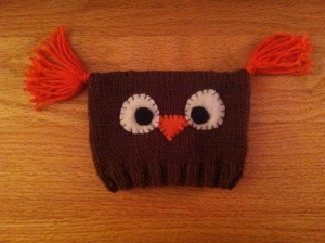A baby owl hat for my coworkers baby cousin. The owl hat is one of my designs. 