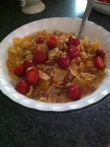 Honey Bunches of Oats with Almonds and fresh picked strawberries.