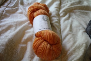 The colorway of this yarn is ripe peach. I got it to make the different lines shawl. 