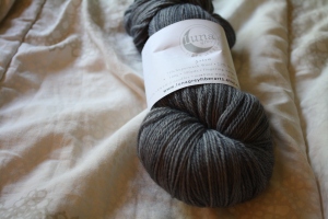 The colorway of this yarn is called charcoal and I got it to pair with ripe peach in the different lines shawl.